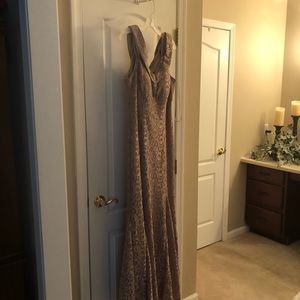 gold  evening gown flared at the bottom